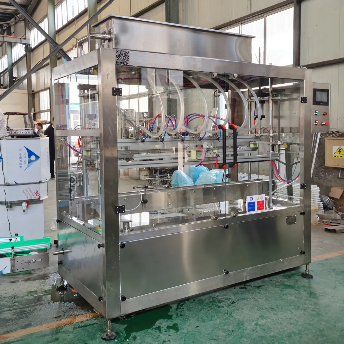 Fully automatic servo pump gravity type multi-head linear 6 filling machine 5